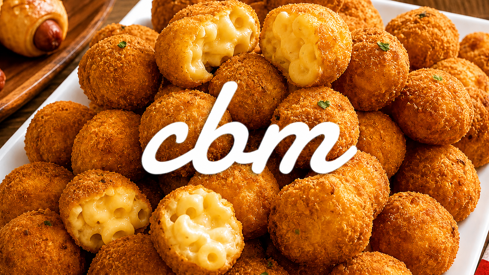 Platter of ChopsByMels fried mac and cheese bites with the cbm logo